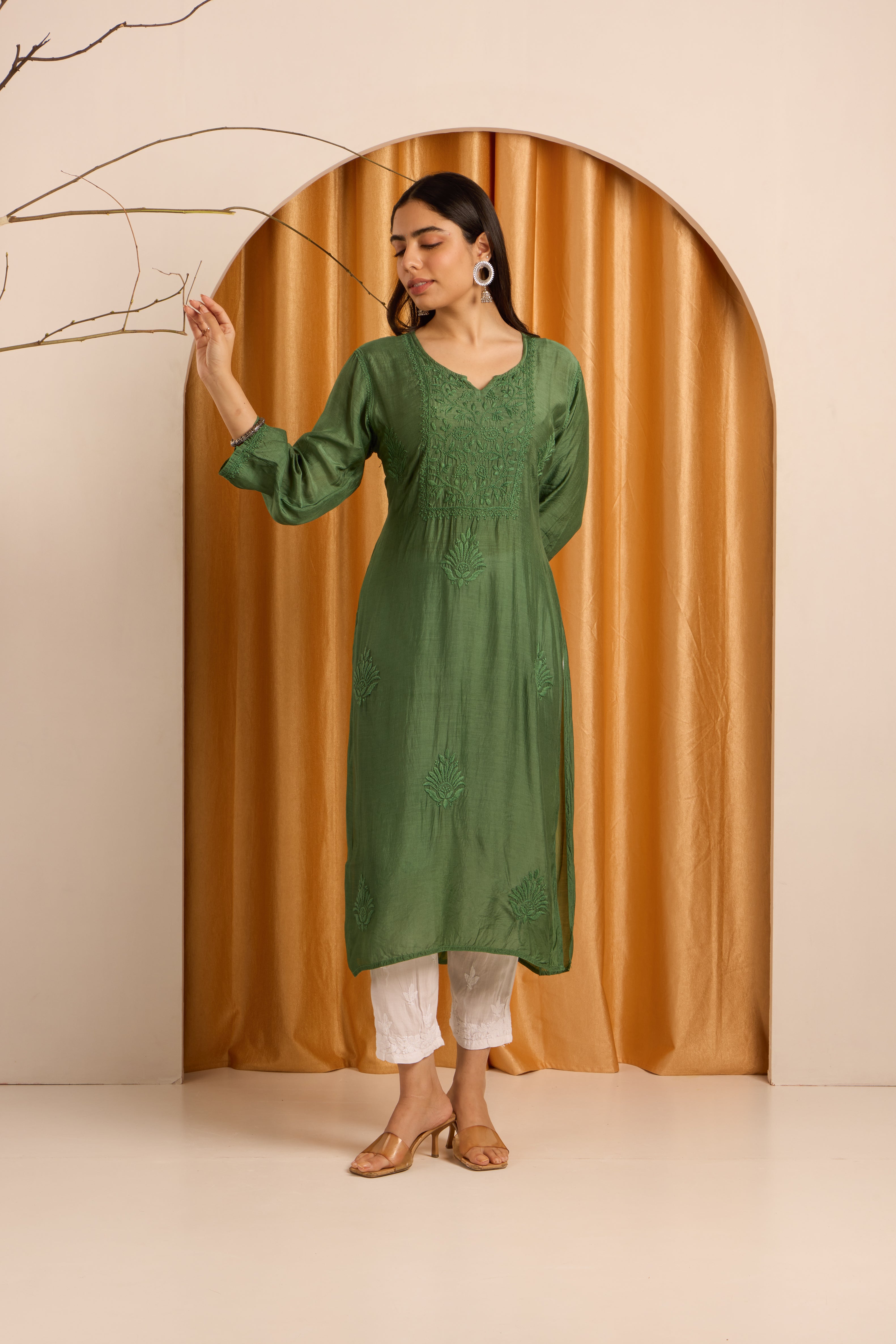 Enigmatic Chikankari Dark Green Kurti