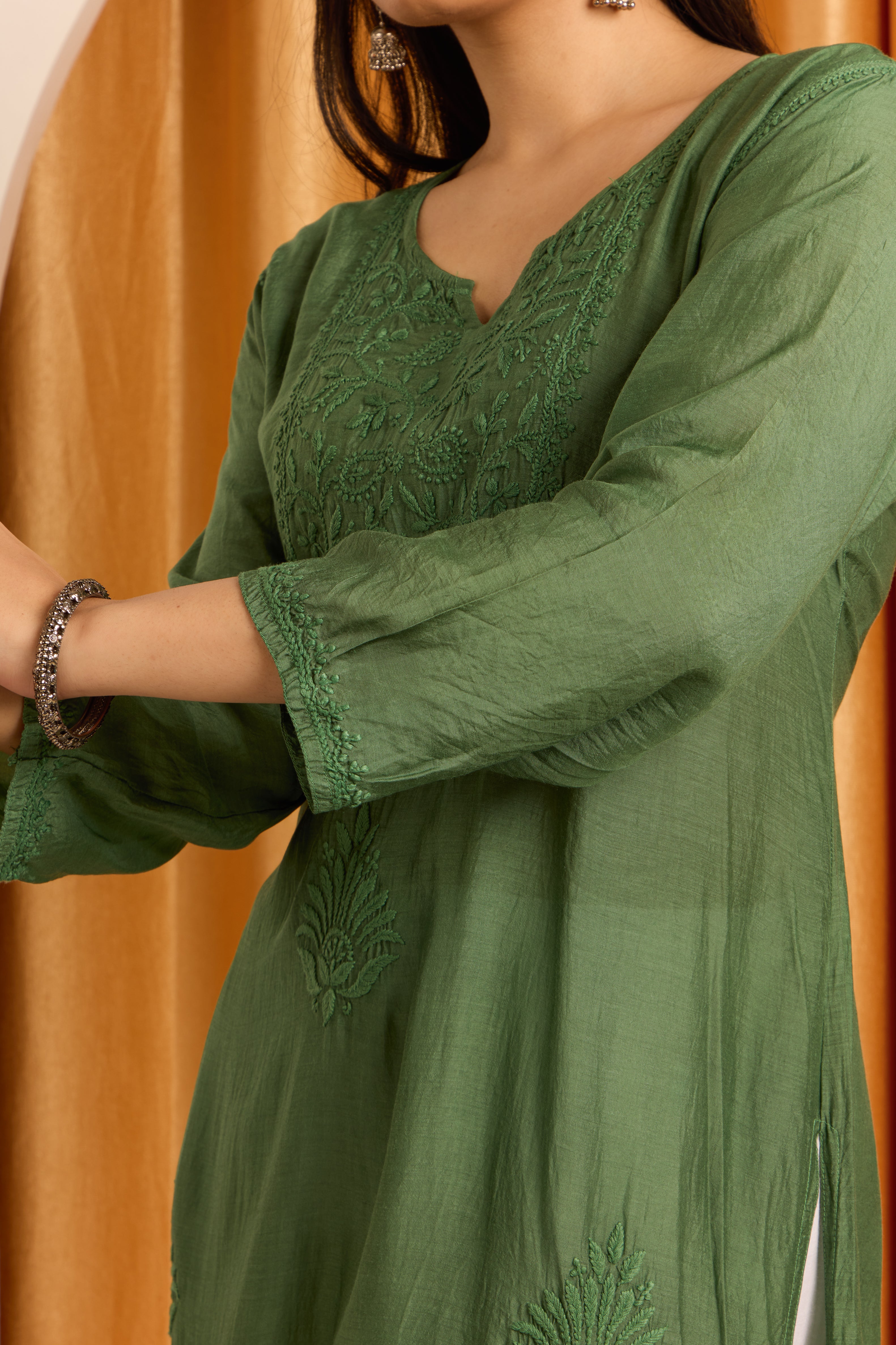 Enigmatic Chikankari Dark Green Kurti